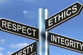 A signpost with indications for ethics, respect, integrity and diversity.